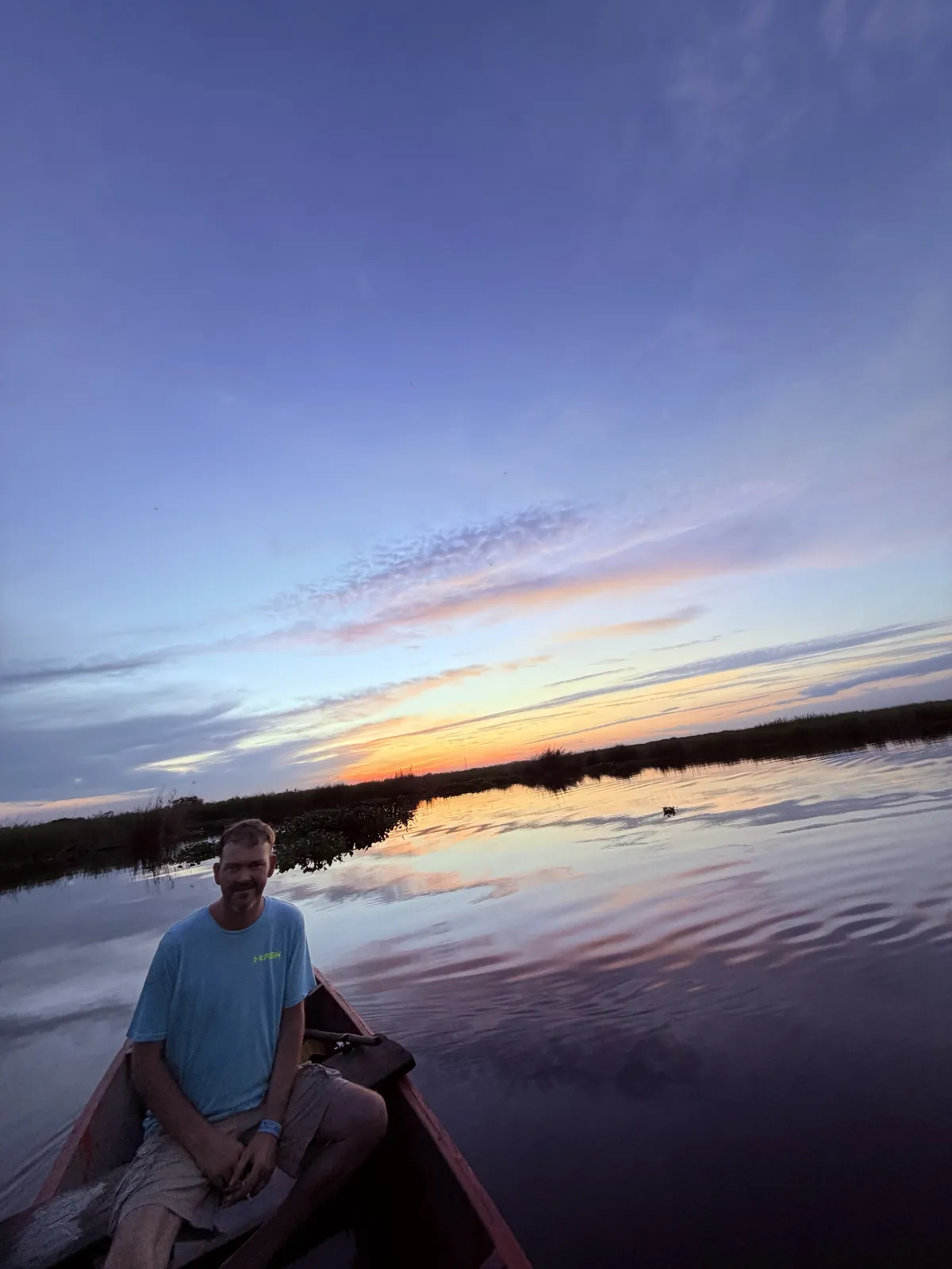 Our Personal Odyssey - Black sand, red canoe