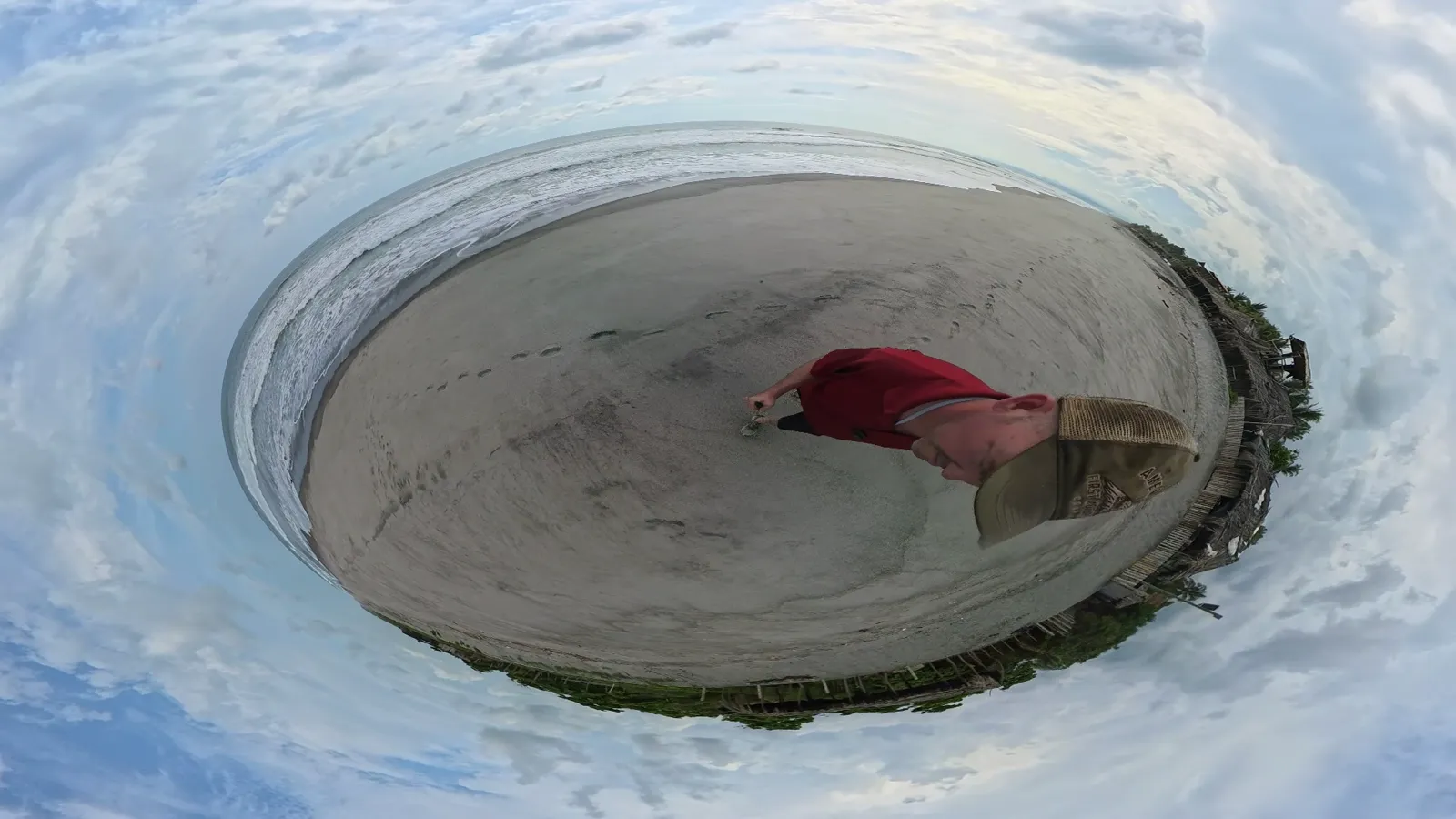 The beach as a tiny planet. That red dot is me.