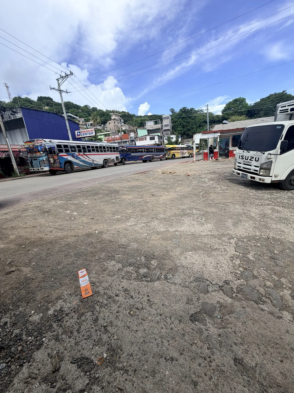 Chicken buses lined up in La Libertad.