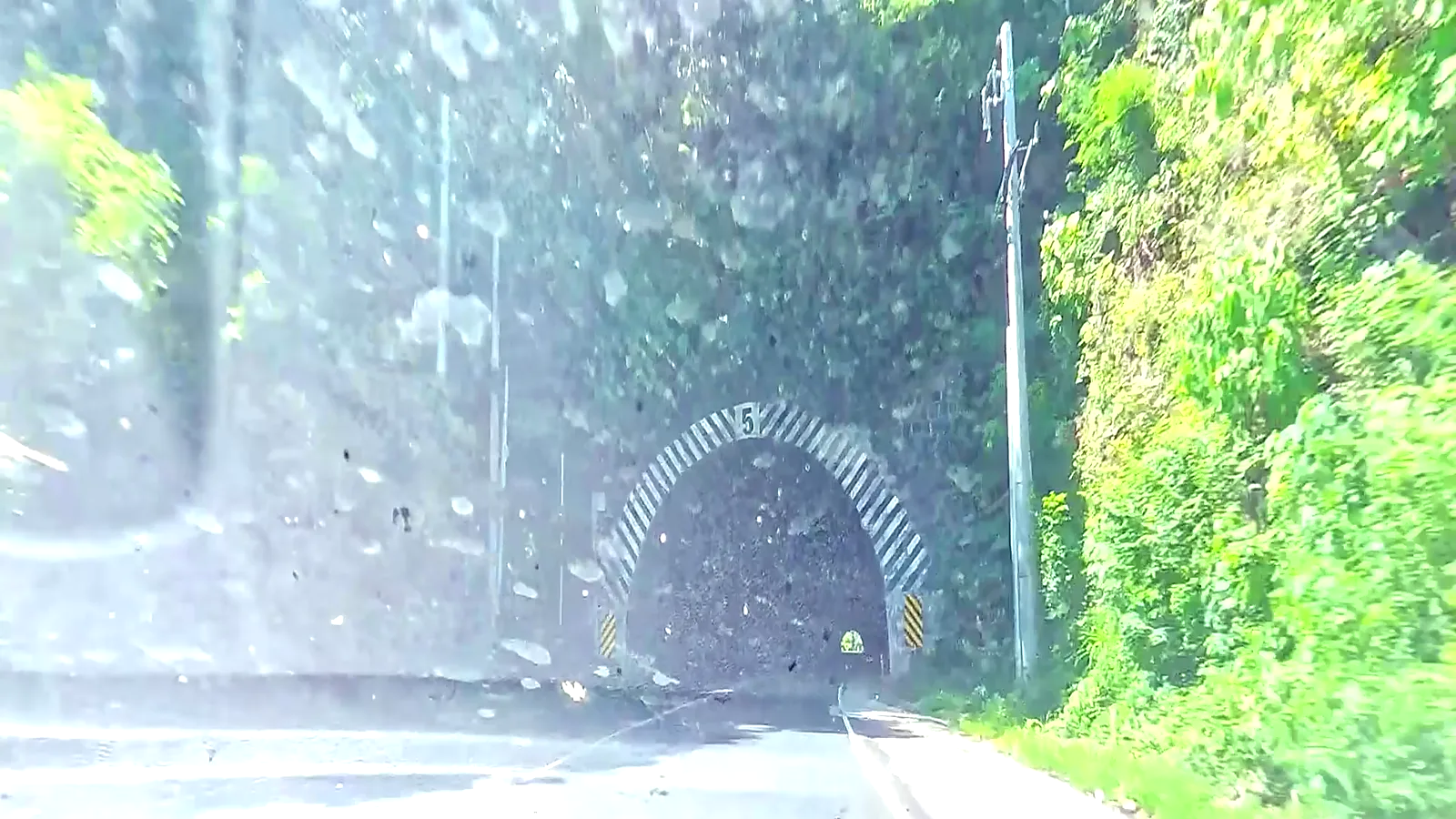 One lane of light at the far end. The tunnels between Mizata and Acajutla.